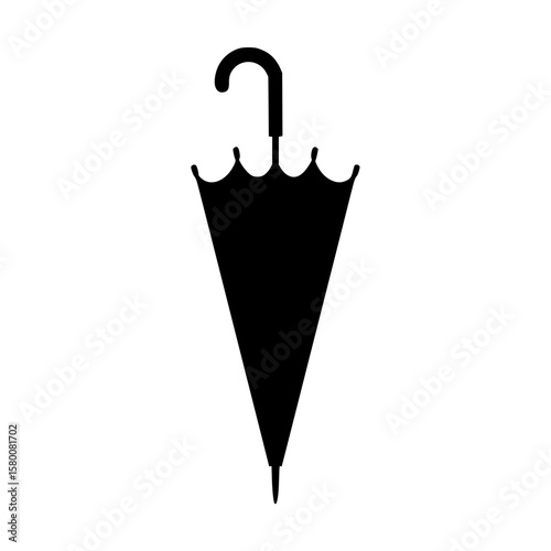 Silhouette of a closed umbrella