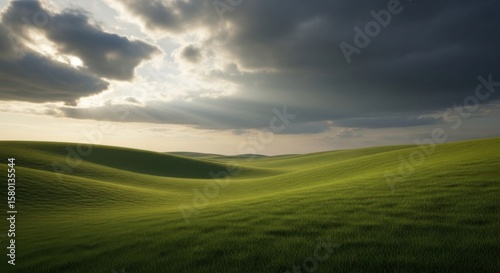 Rolling green hills bathed in dramatic sunlight and stormy clouds overhead
