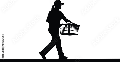 Silhouette of a person wearing a cap carrying a laundry basket woman female