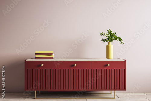Behang Modern red wooden sideboard with yellow vase and books against beige wall in stylish interior room with empty space for design mockup concept