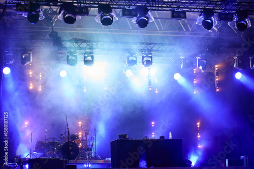 Bilde på lerret Empty stage with bright concert lighting, spotlights and smoke effects prepared