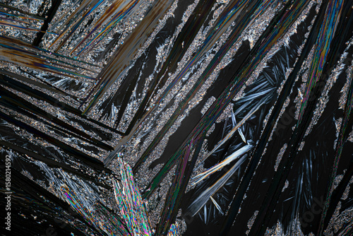 Colorful microcrystals of urea examined under a microscope