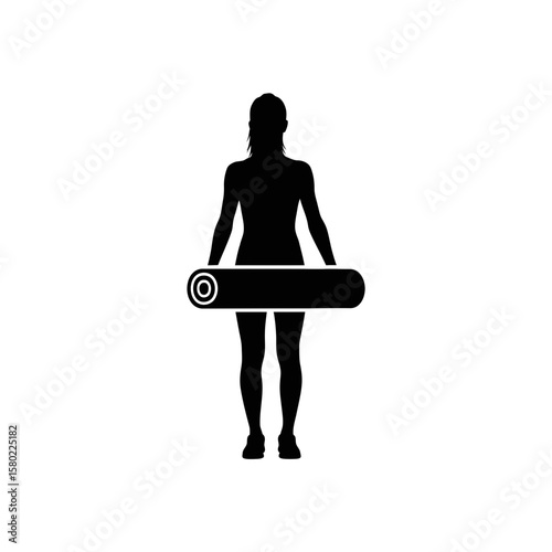 Silhouette of a Woman with an Exercise Mat Before a Workout