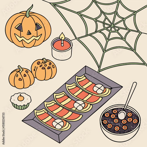 Halloween themed still life featuring pumpkins candle spiderweb and a variety of spooky treats