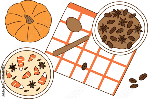 Overhead view of autumn themed food arrangement with pumpkin and spiced dishes on a checkered cloth