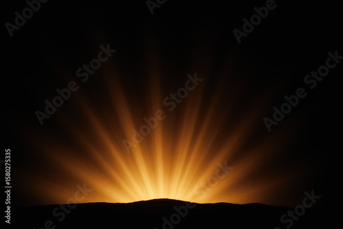 Warm Golden Sunrise Rays Emanating Upward on Black