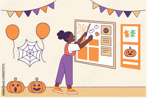 Young girl decorating a classroom or party space with halloween themed decorations and a bulletin board for activities and announcements