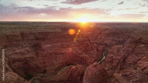 Beautiful Clear Big Sun at Sunrise or Sunset at grand canyon, time Lapse Big Red Hot Sun in Warm Air Distortion Above Horizon Seamless. 4k Ultra HD 60 FPS, Timelapse