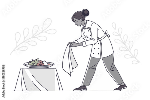Chef meticulously arranging a plate of food with a cloth on a draped table with decorative foliage elements