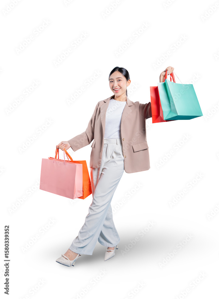 young Asian woman strikes a dynamic, dance-like pose while holding her shopping bags, expressing her pure happiness and excitement against a png background.
young Asian woman strikes a dynamic, dance-like pose while holding her shopping bags, expressing her pure happiness and excitement against a png background.
