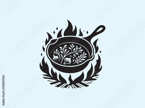 Cast iron pan with thick grip handle on glowing campfire