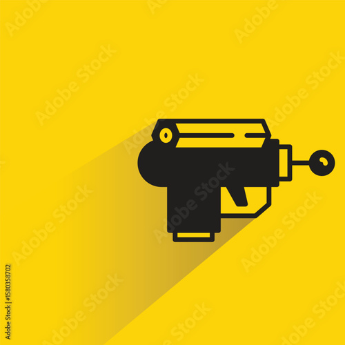space gun icon with shadow yellow background