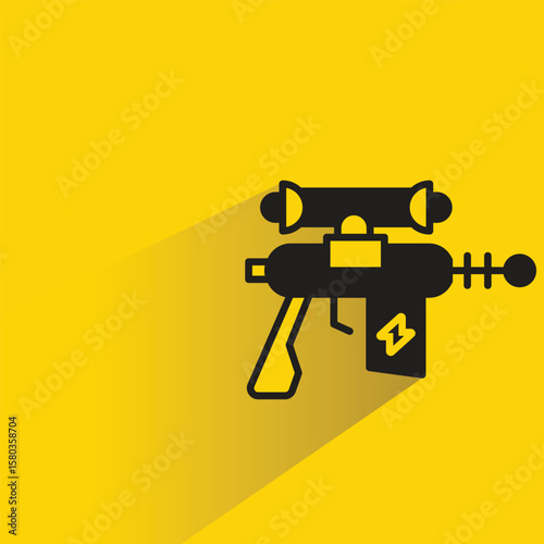 space gun icon with shadow yellow background