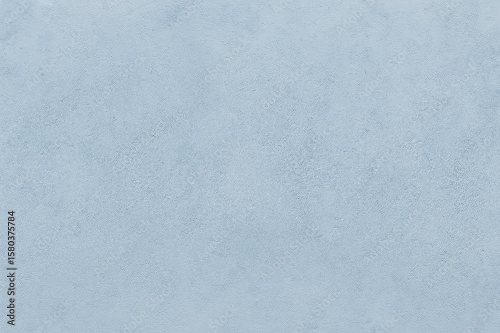 Fototapeta premium Sky-colored concrete backdrop with textured surface design