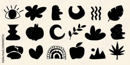 Hand drawn organic abstract shapes in black. Organic shapes, liquid forms in black. Modern minimalistic silhouette elements for contemporary design and branding.