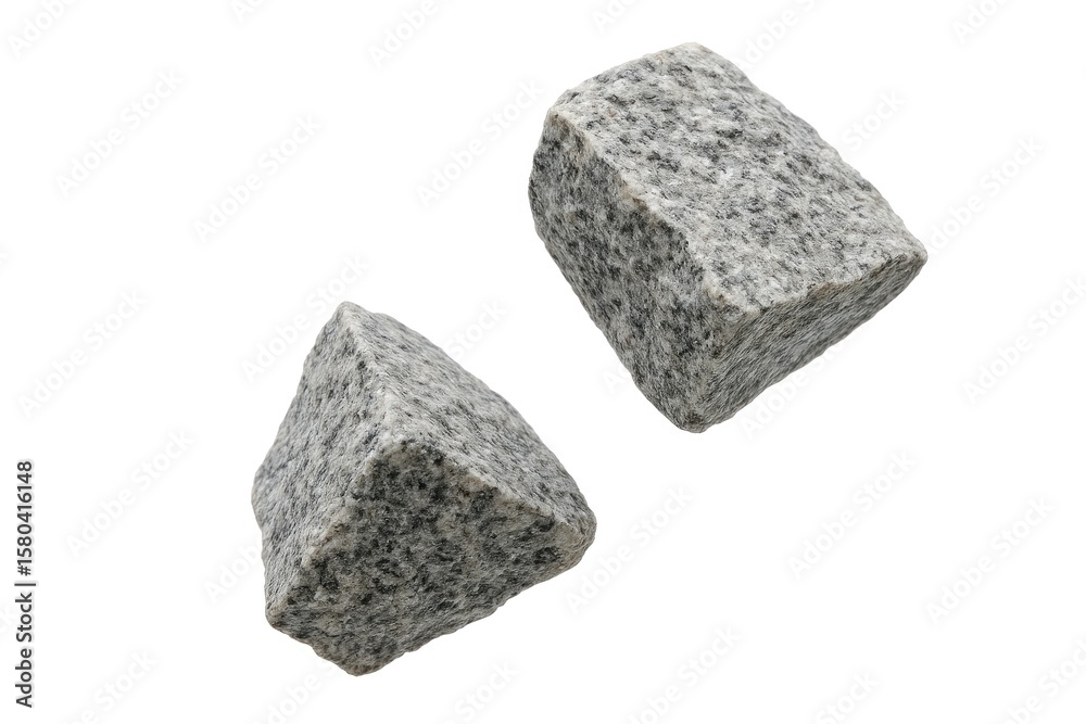 Obraz premium Two pieces of shattered stones dropping against a white background