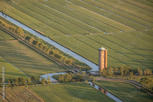 Obraz na plátně Lopik water tower interesting Dutch building converted residential apartments in flat polder farmland Utrecht province
