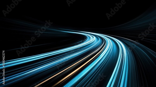 Abstract image of light trails curving through darkness.