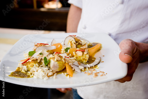 Wallpaper Mural chef holding plate of food Torontodigital.ca