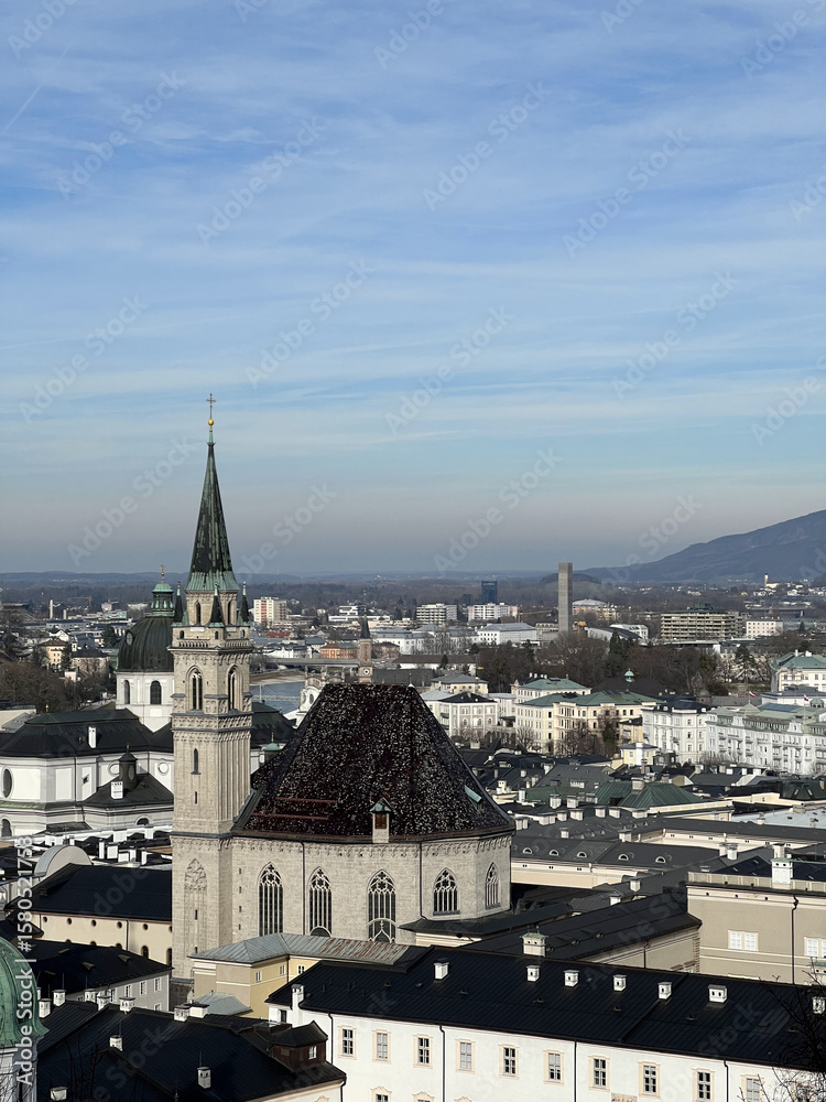 Naklejka premium Panoramic View of Salzburg with Historic Cityscape and Alpine Backdrop