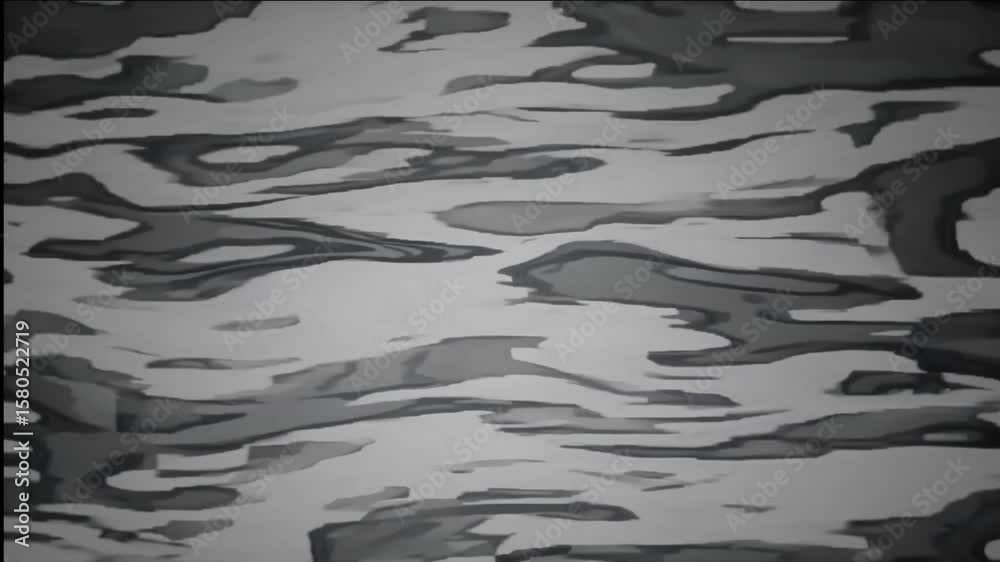 Abstract camouflage pattern with irregular dark gray shapes on a light gray background