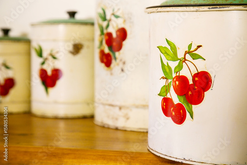 A set of antique tin cannisters