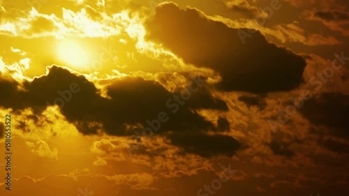 Time lapse bright orange sunset sun sets behind the clouds. The end of the day, the sun goes below horizon. sunset background time lapse adventure