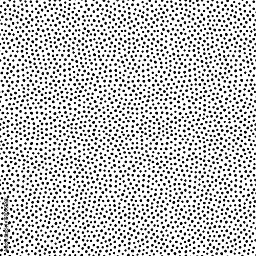 Polka dot seamless pattern in black and white. Hand drawn vector texture with dynamic rough dots and organic flow. Perfect for abstract fabric, print, or wallpaper. To use, drag into swatches panel.