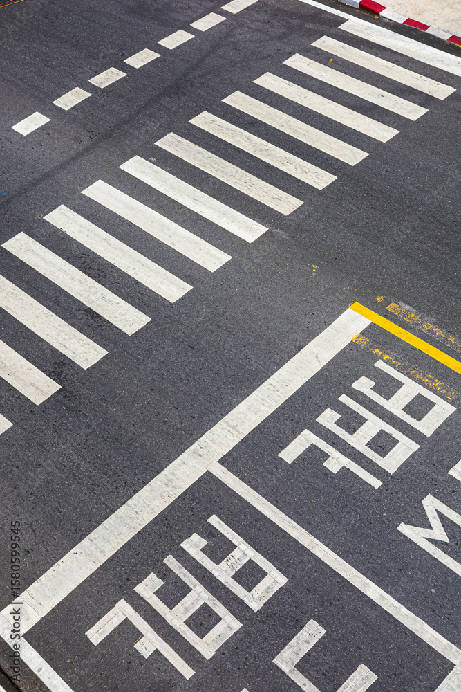 Fototapeta premium Urban Pedestrian Crossing Motorcycle Parking Lines