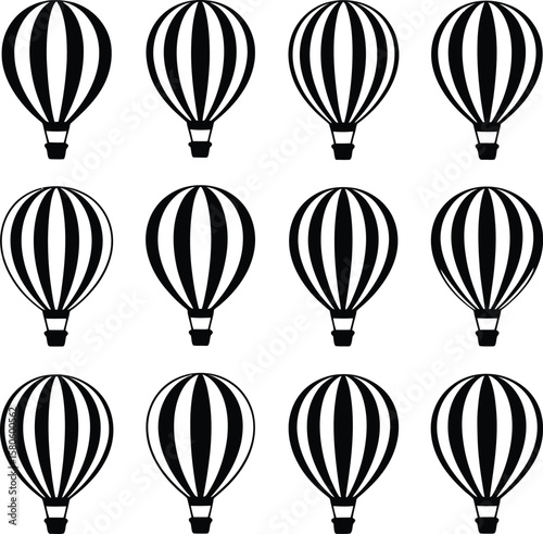 A repeating pattern of black and white striped hot air balloons