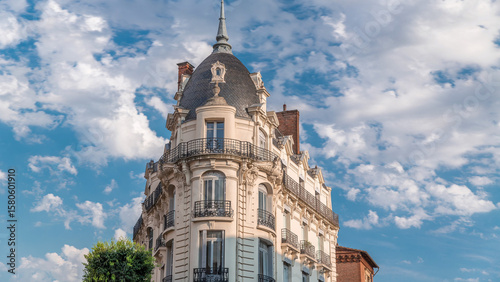 Historic facades at Rue du Languedoc and Theodore Ozenne intersection timelapse in Toulouse, France.