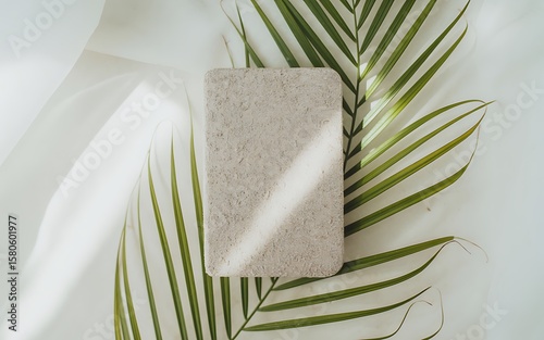 Wallpaper Mural Textured stone block with green palm leaves on white fabric natural Torontodigital.ca
