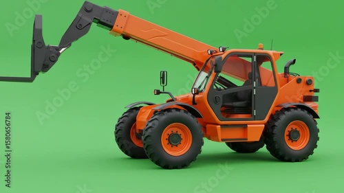 chroma key green background of an orange telehandler with pallet forks