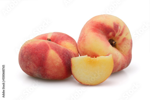 Fig peaches isolated on white background. Fig peach has many names - flat peach, saucer peach, peach donut, etc.
