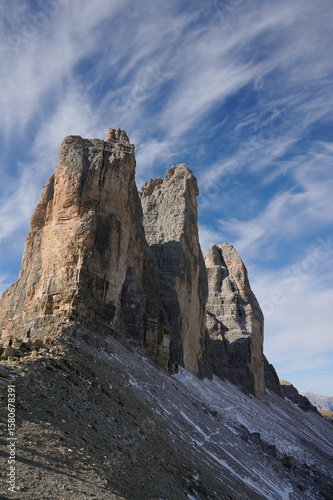 tre cimes in the dolomites with blue sky and clouds