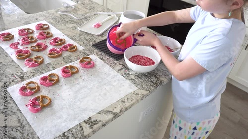Young Chef Prepares Chocolate-Covered Treats in Sunny Kitchen