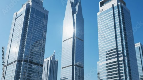 Wallpaper Mural Clear blue sky frames modern glass skyscrapers reflecting sunlight Torontodigital.ca