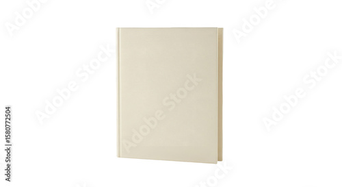 Blank cream colored book resting on a black background.