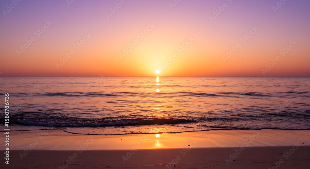 Naklejka premium Sunset over the ocean horizon with warm reflections on the water and footprints in the sand, concept of tranquility, natural beauty, and peaceful seaside moments.