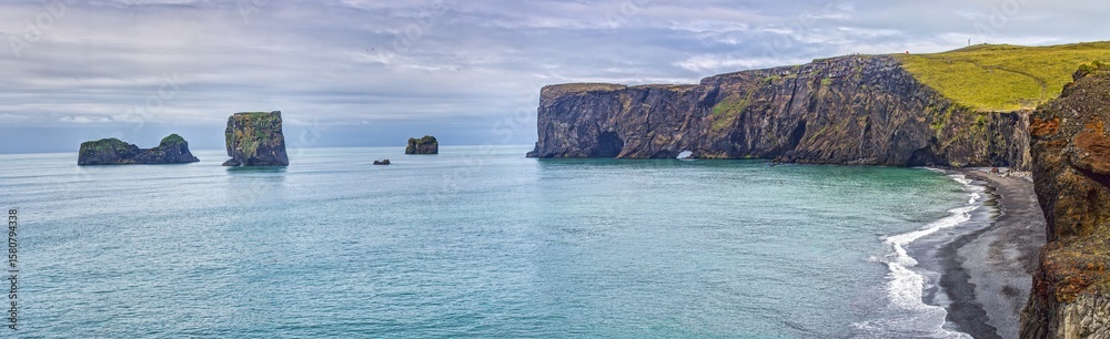 Fototapeta premium Sea stacks and cliffs Reynisfjara beach Iceland