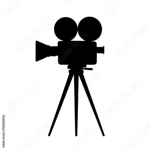 Silhouette of a vintage video camera on a tripod