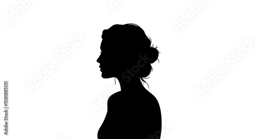 Silhouette of a woman with hair in a bun. 