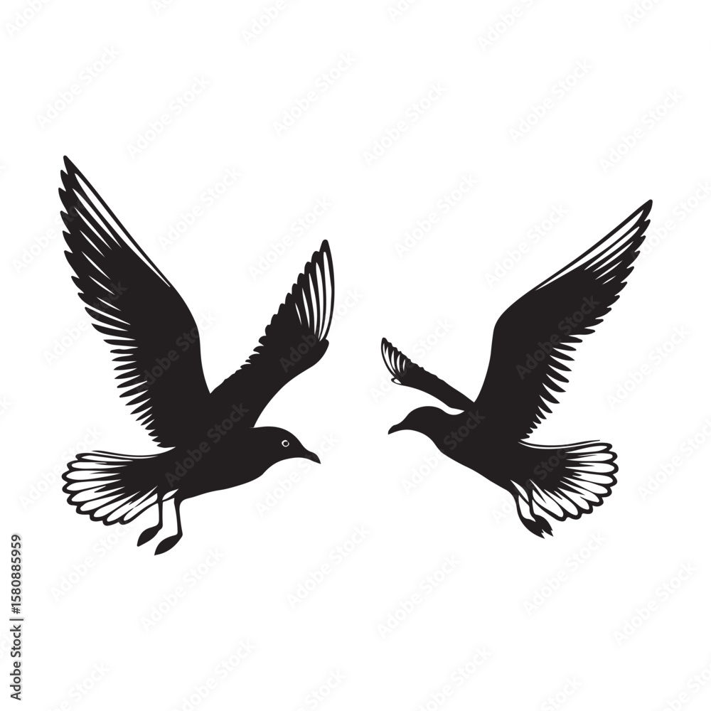 Fototapeta premium Two black silhouettes of seagulls in flight against a white background