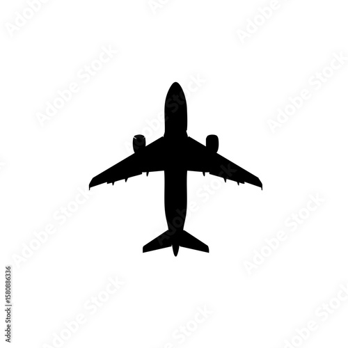 Silhouette of an aircraft captured from above. 