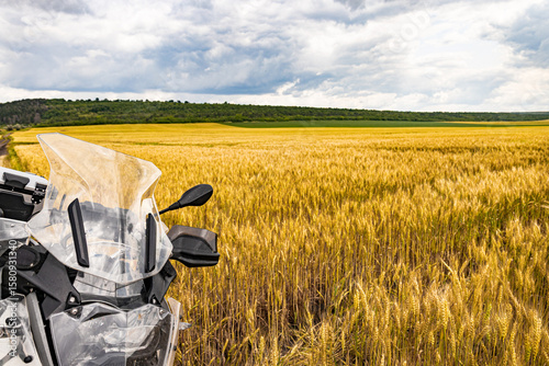 Motorcycle on a trip, front part, front part view.