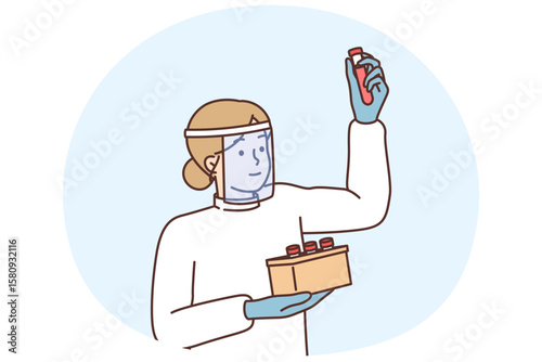Woman nurse holds test tube with patient blood to make analysis for presence of virus or infection