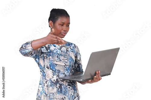 young teenage girl standing with laptop.