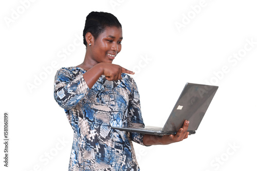 young teenage girl standing with laptop.