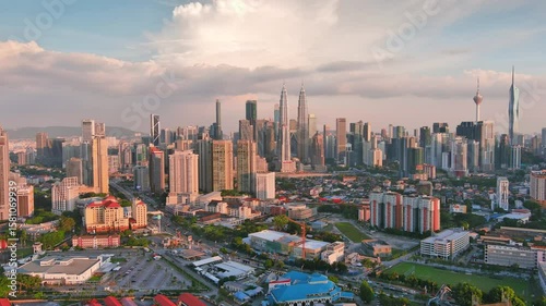 Kuala Lumpur, Malaysia: Aerial view of capital city of Malaysia, modern skyline at sunset, perfect for travel, business, or development projects - landscape panorama of Southeast Asia from above
