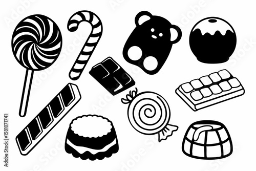 Collection of black and white candies and chocolates on a white background